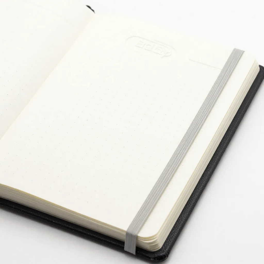 Liggflat planlegger med debosert omslag